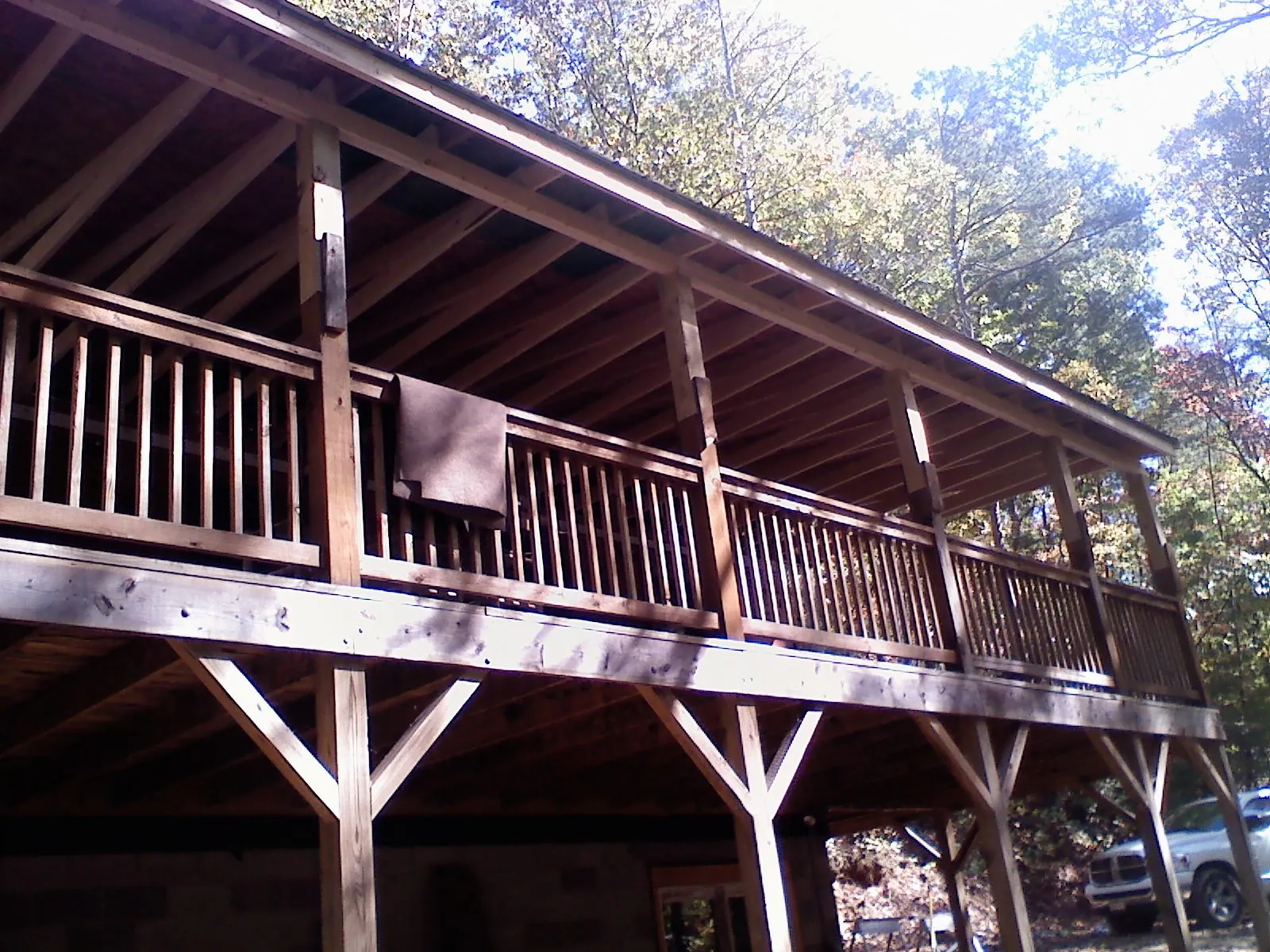 Timber framing under a new elevated porch and deck — Roof Leak Repair in Village Mills by Roofing Brothers